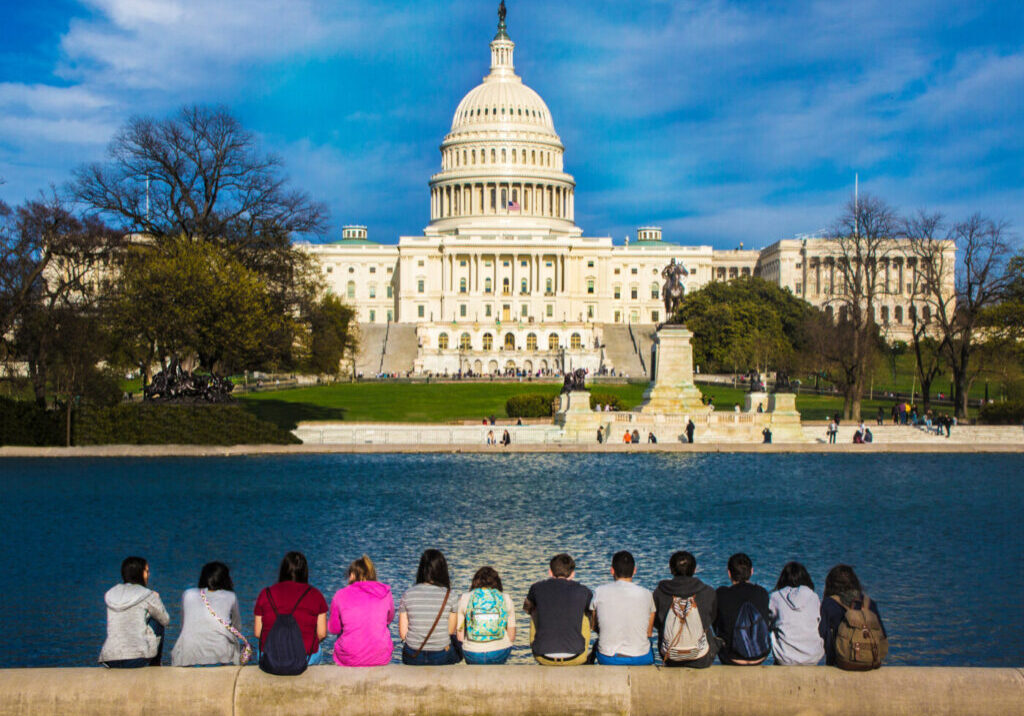 Touring,Students,Take,A,Break,While,Visiting,Washington,,Dc,And